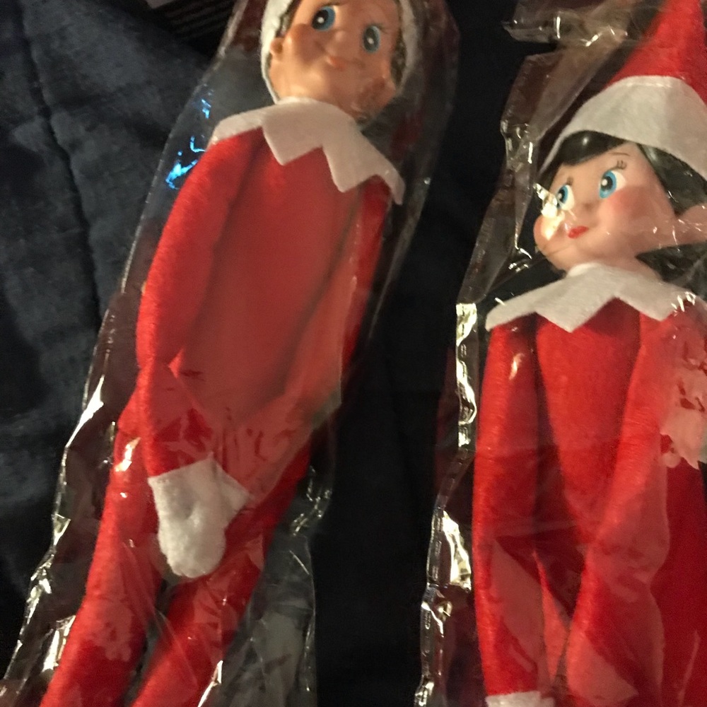 Brand new unopened boy and girl elf on shelf